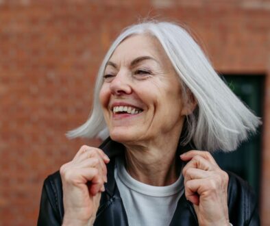 Smiling woman with healthy hair in Long Island, New York